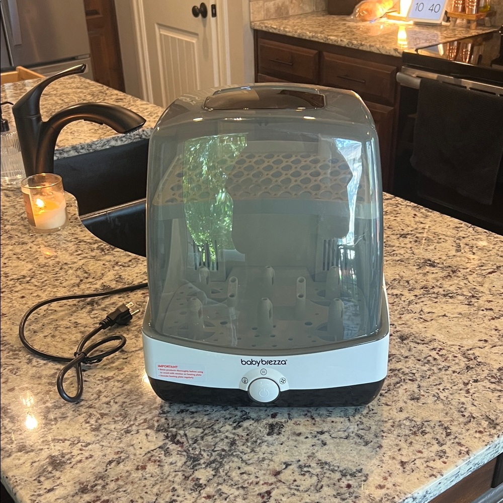 Baby Brezza Sterilizer in Gray and White